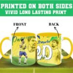 Two yellow-handled mugs side by side with a green-yellow soccer print; the front mug shows a player while the back mug shows another view, with a green banner announcing “PRINTED ON BOTH SIDES VIVID LONG LASTING PRINT.”