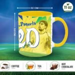 Yellow promotional mug featuring Paquetá design, 8.1 cm wide by 9.6 cm tall, 11 oz capacity, shown on a field with coffee/tea/hot chocolate icons below.
