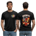 Two men in black T-shirts; front shows a small Belgium 2026 logo, back features a fiery soccer graphic with a player, 'DOKU' and number 11.