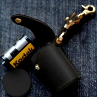 black-camera-film-bottle-case