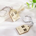 Celebrate a new home and special memories with personalised house keychain pairs, custom engraved to create a meaningful gift for couples and families.eg
