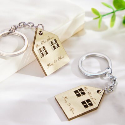 Celebrate a new home and special memories with personalised house keychain pairs, custom engraved to create a meaningful gift for couples and families.