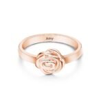 Rose gold ring with a sculpted rose centerpiece; inside the band, the name 'Amy' is engraved.